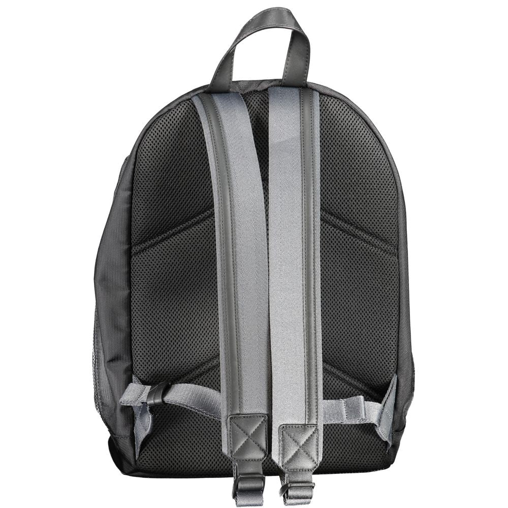 Sac à dos pour homme Calvin Klein en polyester noir, avec compartiments et design épuré.
