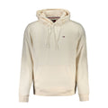 Sweat-shirt blanc en coton pour homme de Tommy Hilfiger, avec logo discret sur la poitrine, porté sur un mannequin.