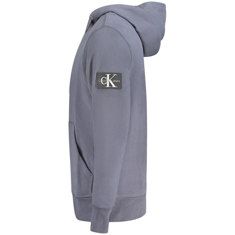 Pull homme en coton bleu de la marque Calvin Klein, classique et confortable, avec col rond et finition soignée.
