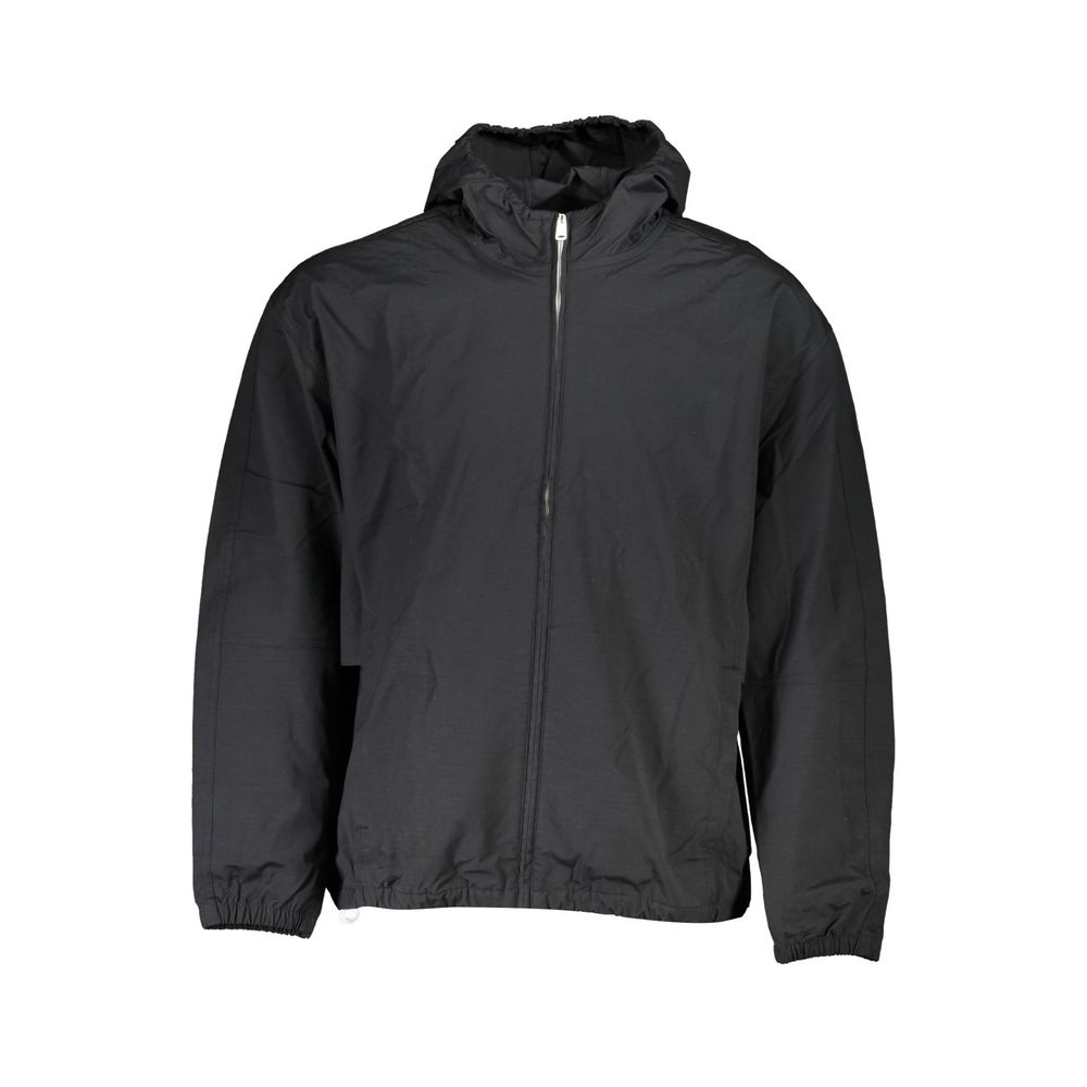 Veste en coton noir pour homme de Calvin Klein, montre le style ajusté et la texture douce du tissu.
