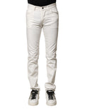 Pantalon en jean blanc skinny pour homme de Dolce & Gabbana en coton, aspect denim, visible devant avec coutures et fermeture éclair