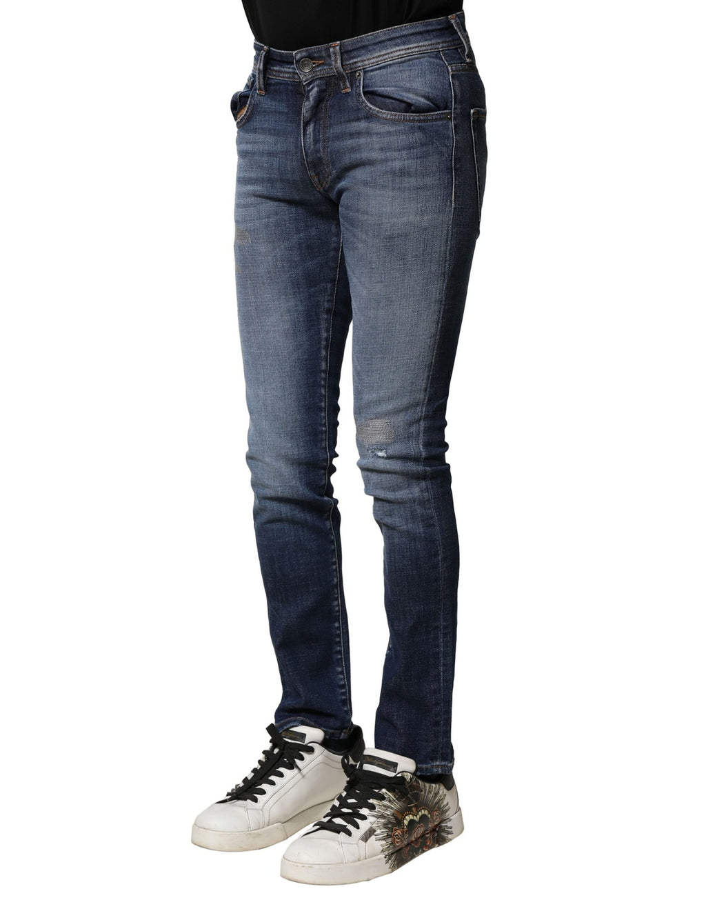 Jeans homme slim en coton bleu délavé de Dolce & Gabbana, coupe ajustée et moderne.