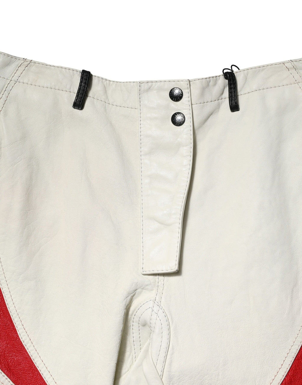 Pantalon homme en cuir de mouton bicolore Dolce & Gabbana, coupe tapered, mode élégante et moderne.