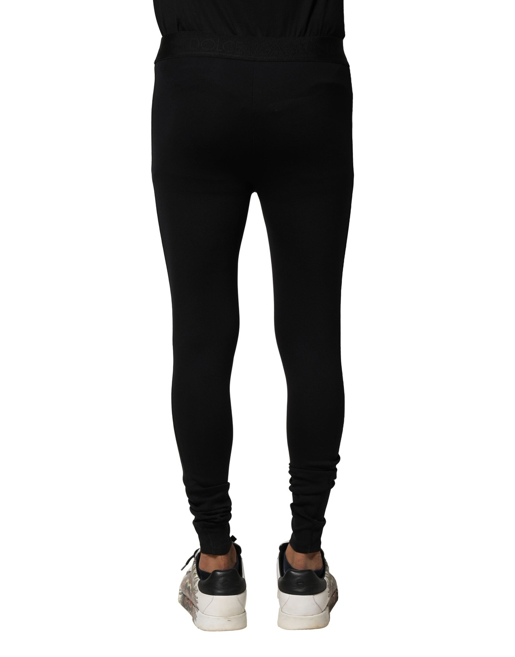 Leggings pour hommes Dolce & Gabbana en nylon noir avec logo élastique, style moderne et confortable.