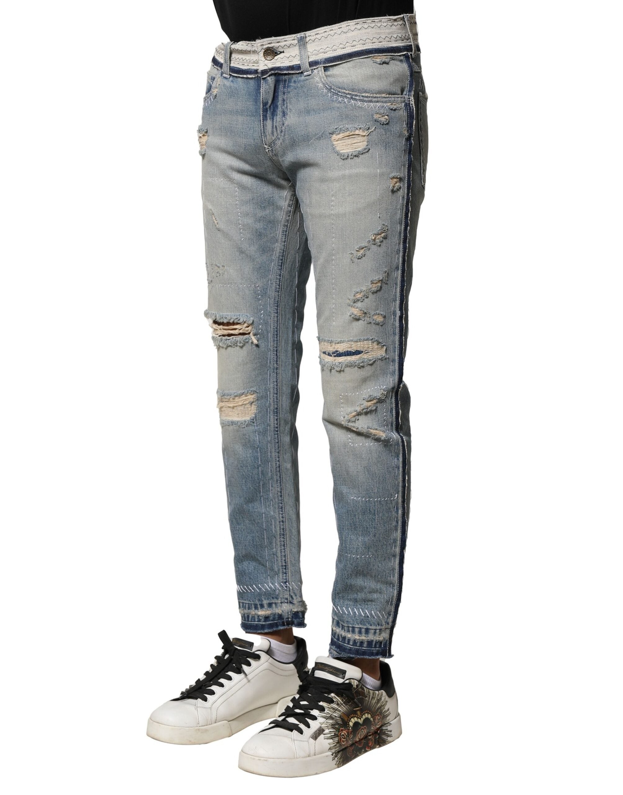 Jeans homme Dolce & Gabbana Light Blue Tattered Straight en denim bleu avec déchirures et coupe droite.