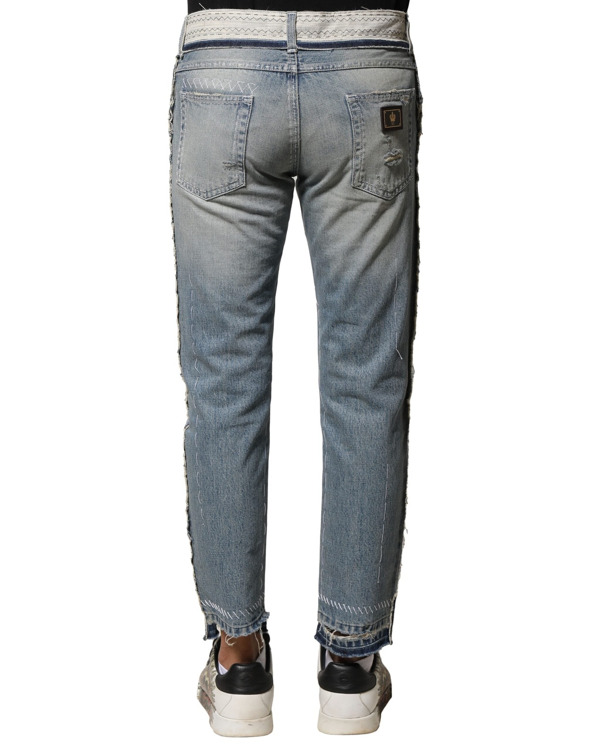 Jeans homme Dolce & Gabbana Light Blue déchirés et droits en denim, style moderne et tendance, vue de face.