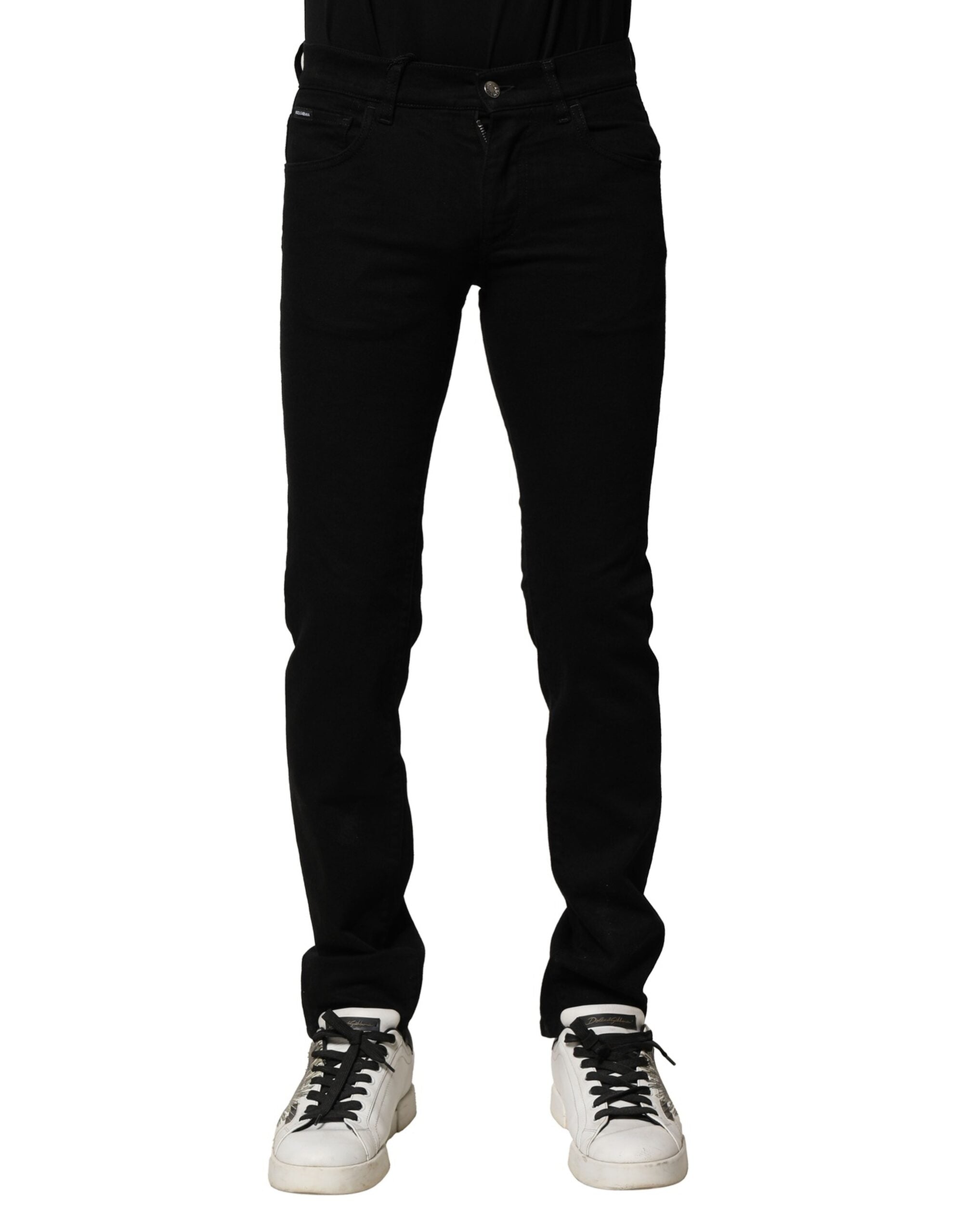 Jeans homme Dolce & Gabbana en coton stretch noir skinny, denim, ajustés et élégants, visibles en gros plan.