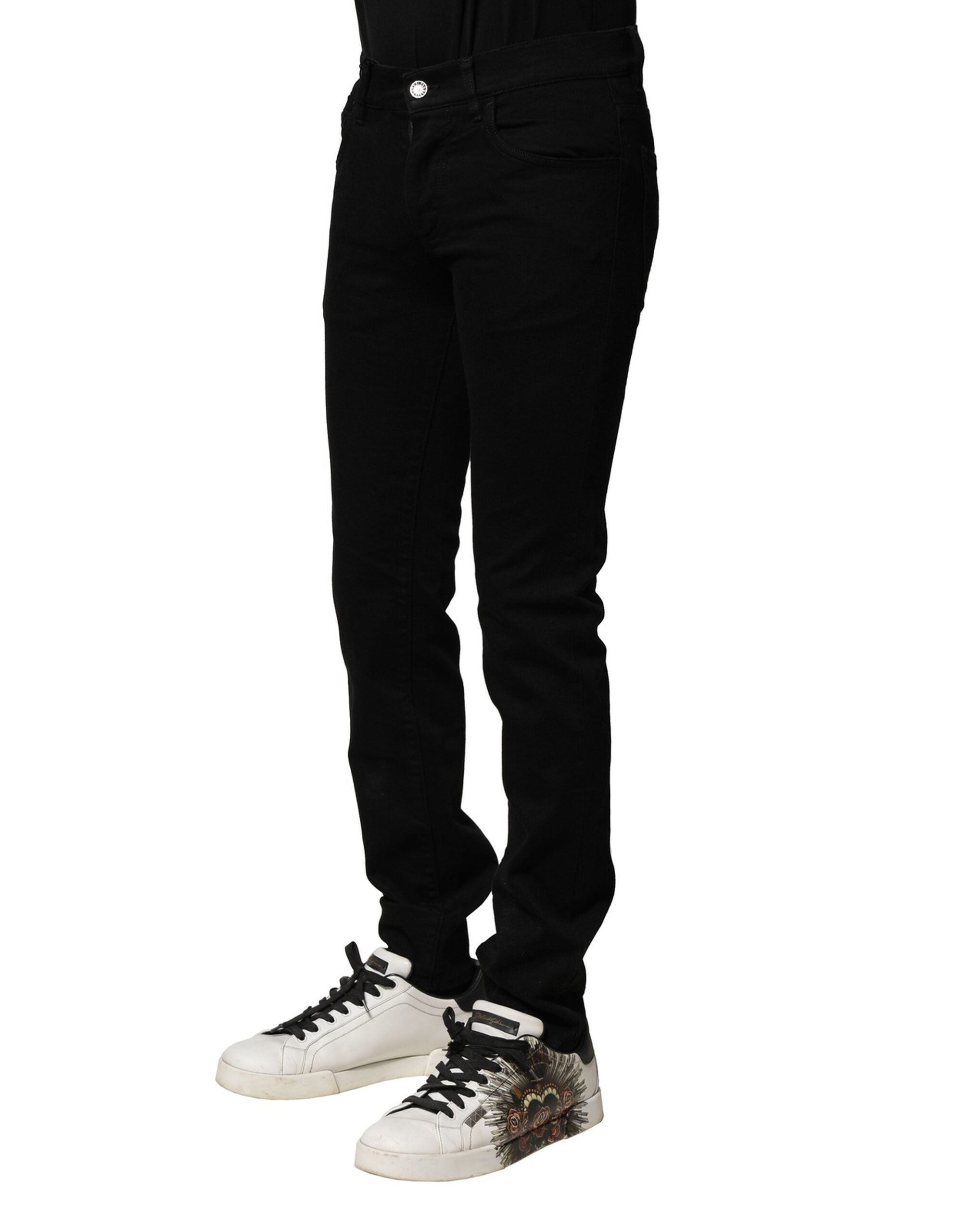 Jeans slim en coton stretch noir de Dolce & Gabbana pour homme, coupe skinny et style moderne.