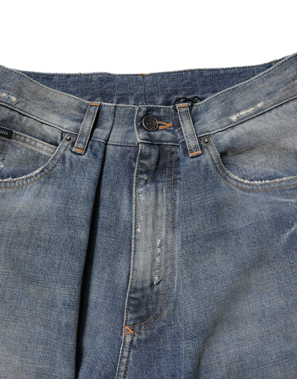 Jean homme en denim bleu Dolce & Gabbana, coton avec déchirures, style décontracté et tendance.