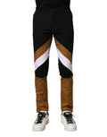 Pantalon homme Dolce & Gabbana en coton multicolore, coupe slim, visible avec détails de couture et design élégant.