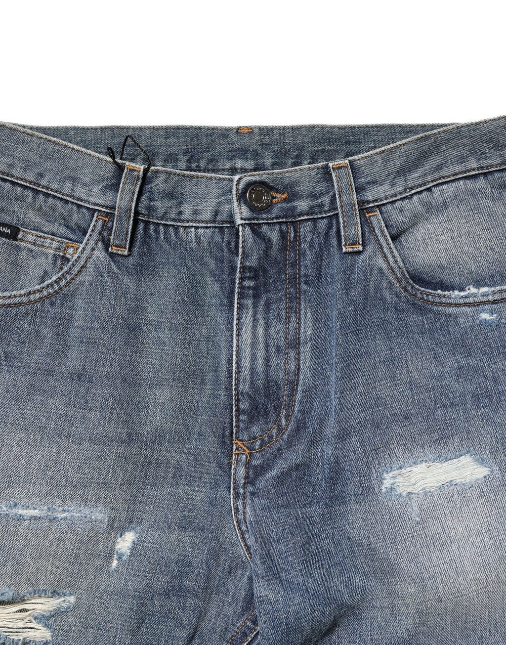 Jeans en denim bleu délavé et déchiré Dolce & Gabbana, coupe droite, style décontracté et tendance.