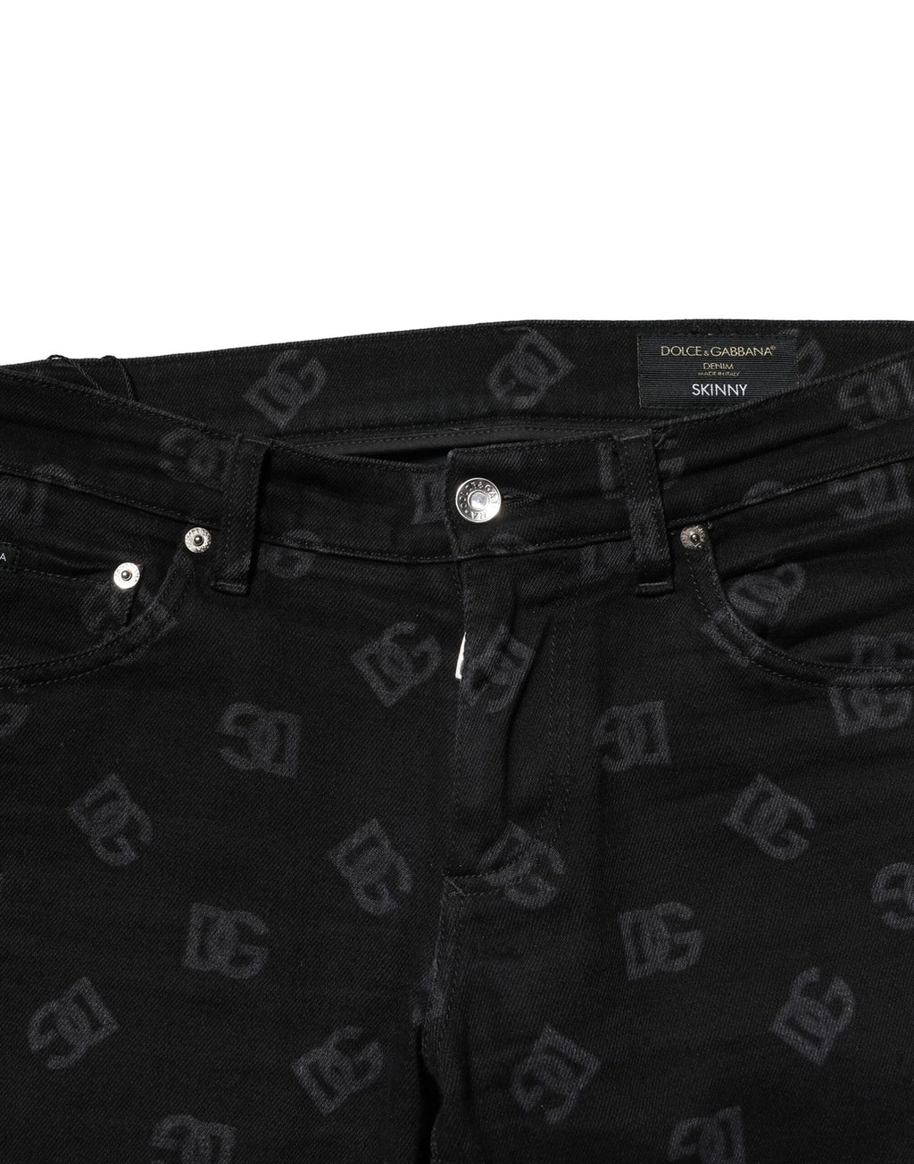 Jeans skinny en coton noir Dolce & Gabbana avec logo DG, style denim pour homme, visible avec détails de la coupe et de la texture.