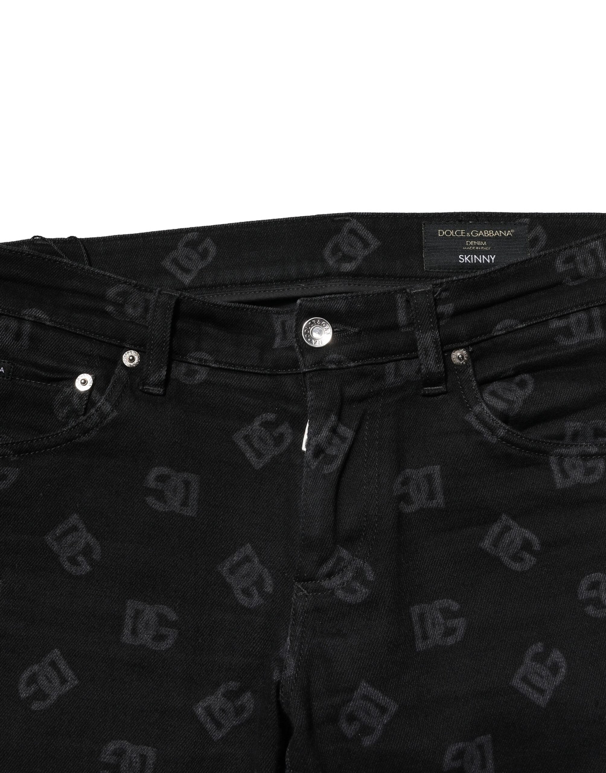 Jeans skinny en coton noir Dolce & Gabbana avec logo DG, style denim pour homme, visible avec détails de la coupe et de la texture.
