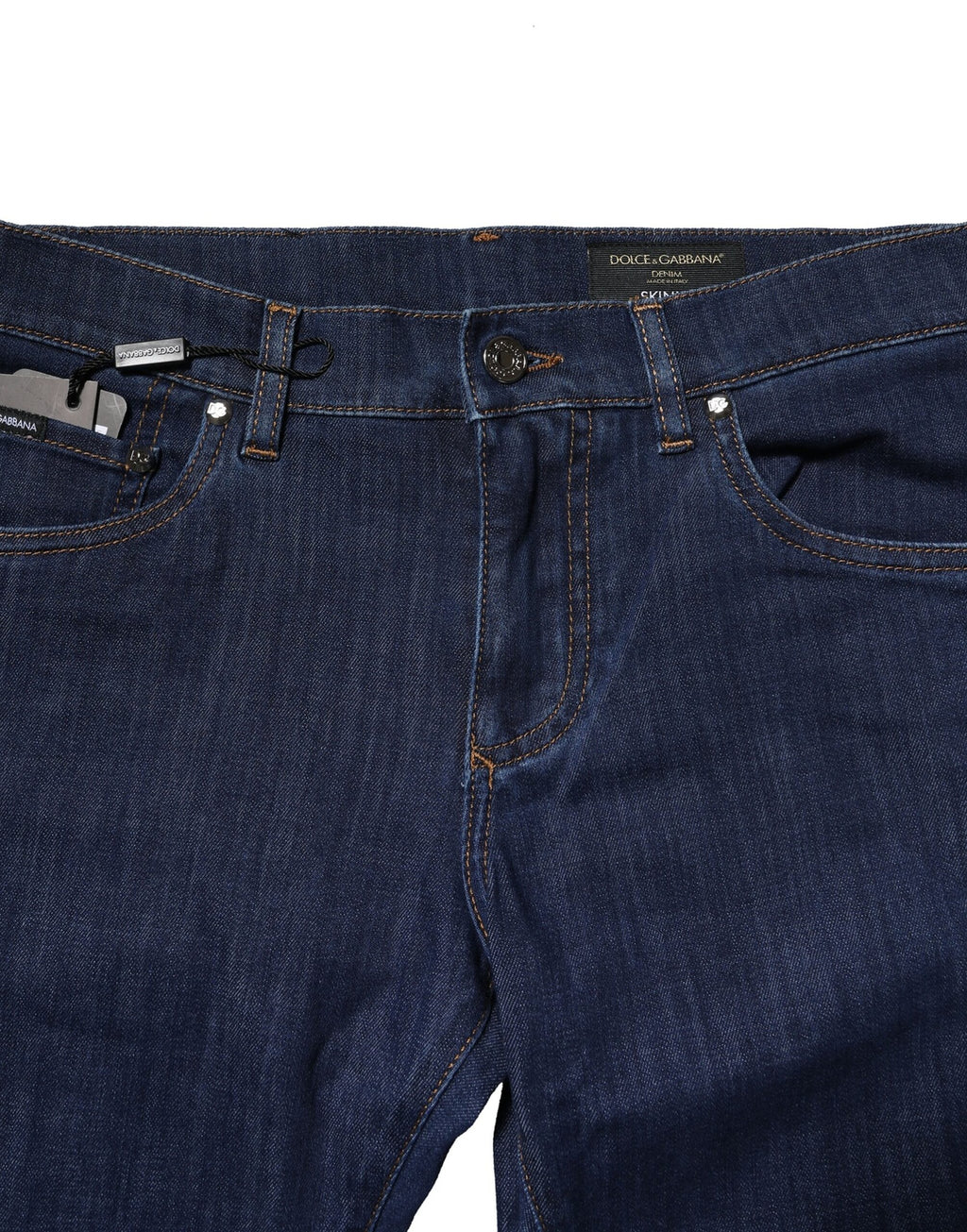 Jeans homme Dolce & Gabbana en denim bleu, coupe skinny, en coton stretch, visible devant avec poches et coutures.