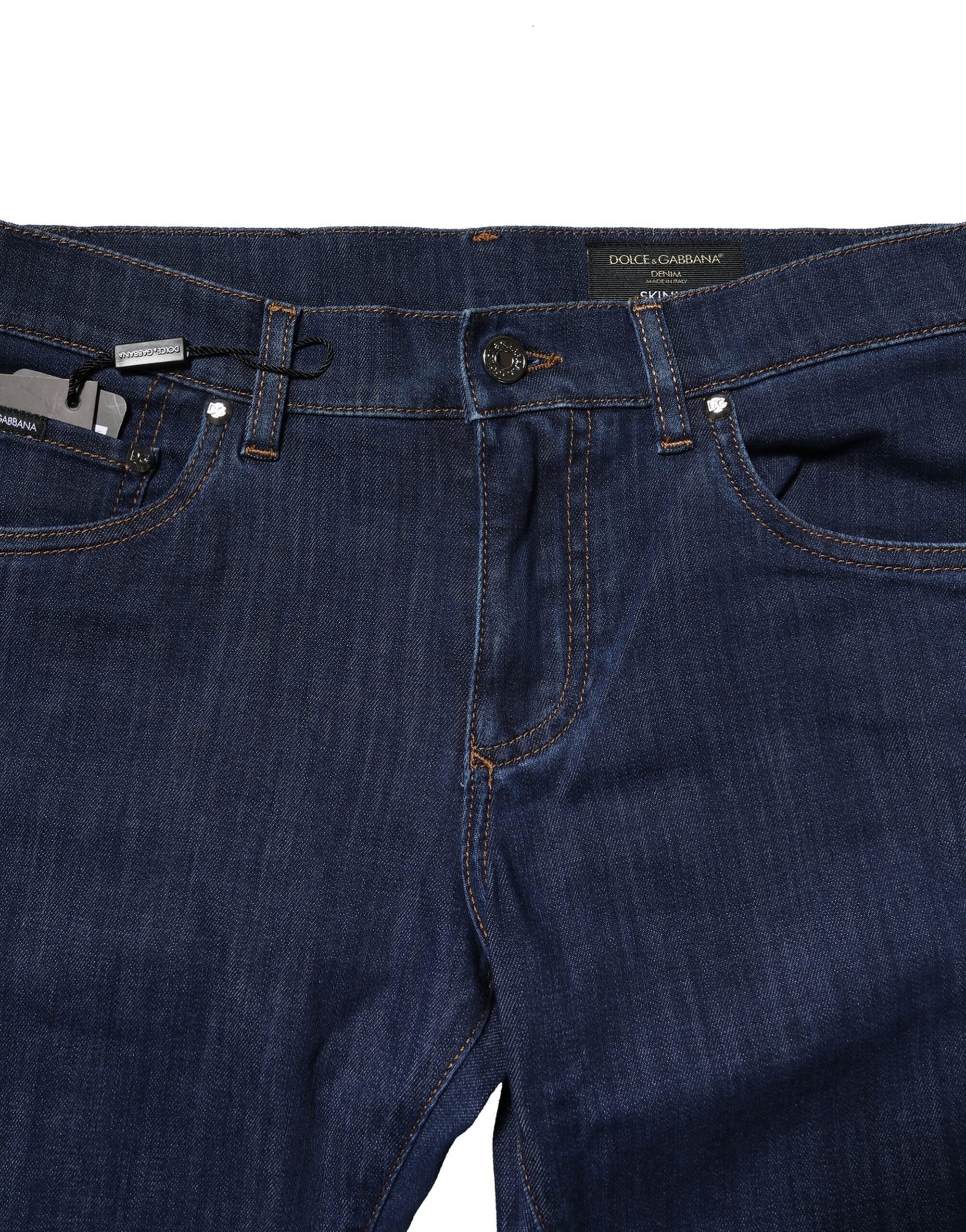 Jeans homme Dolce & Gabbana en denim bleu, coupe skinny, en coton stretch, visible devant avec poches et coutures.