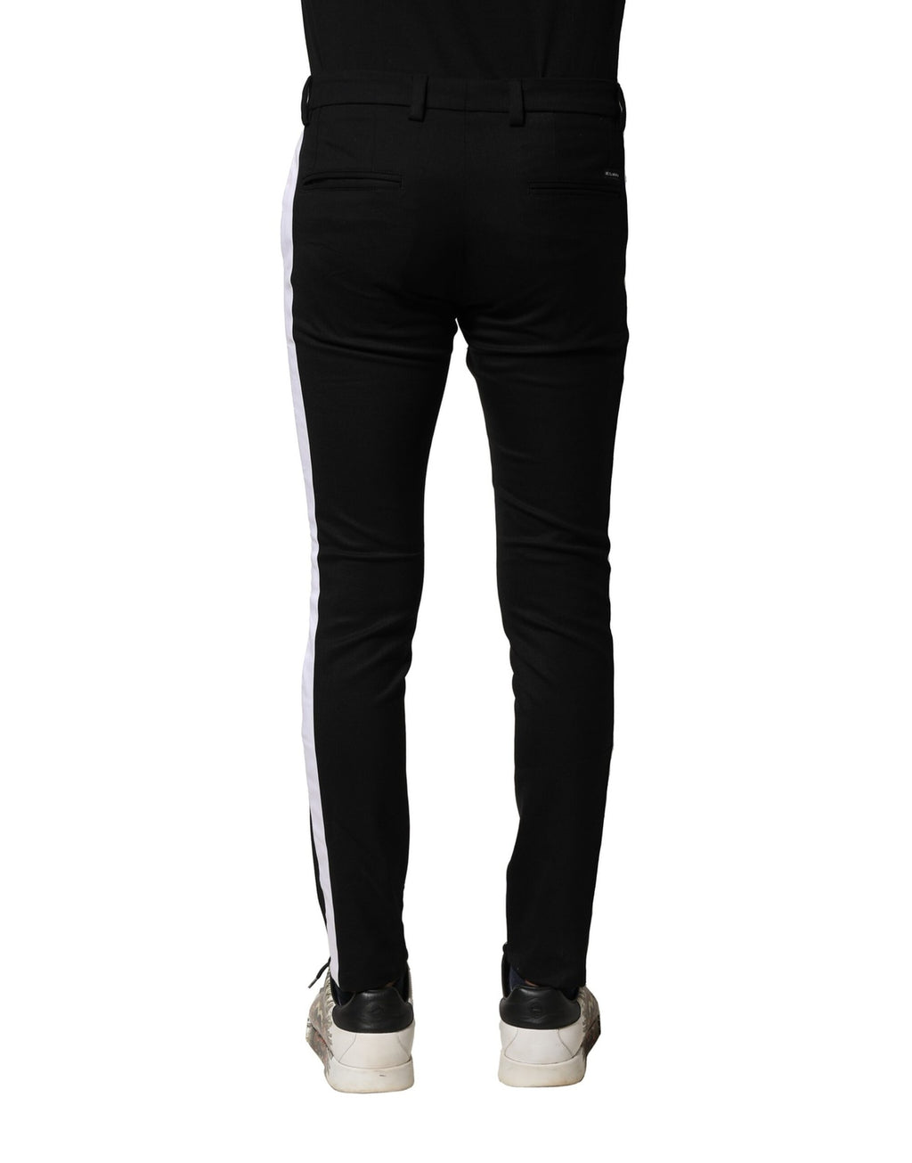 Pantalon skinny en laine noire pour homme de Dolce & Gabbana, taille mi-haute, ajusté et élégant.