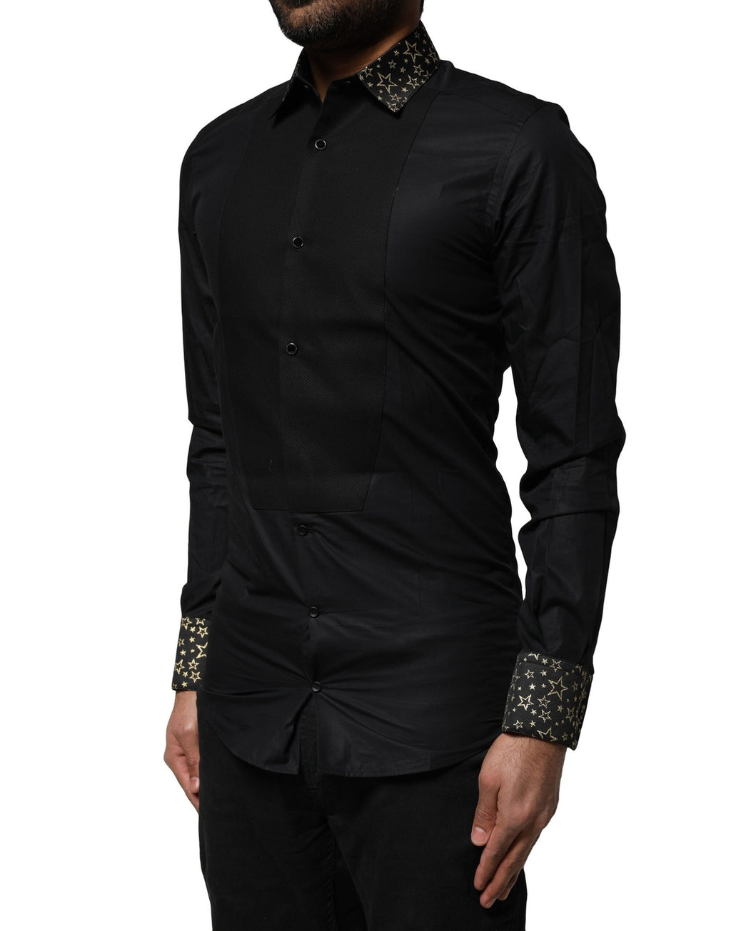 Chemise longue noire en coton Dolce & Gabbana avec manches longues et détails dorés, élégante et sophistiquée.
