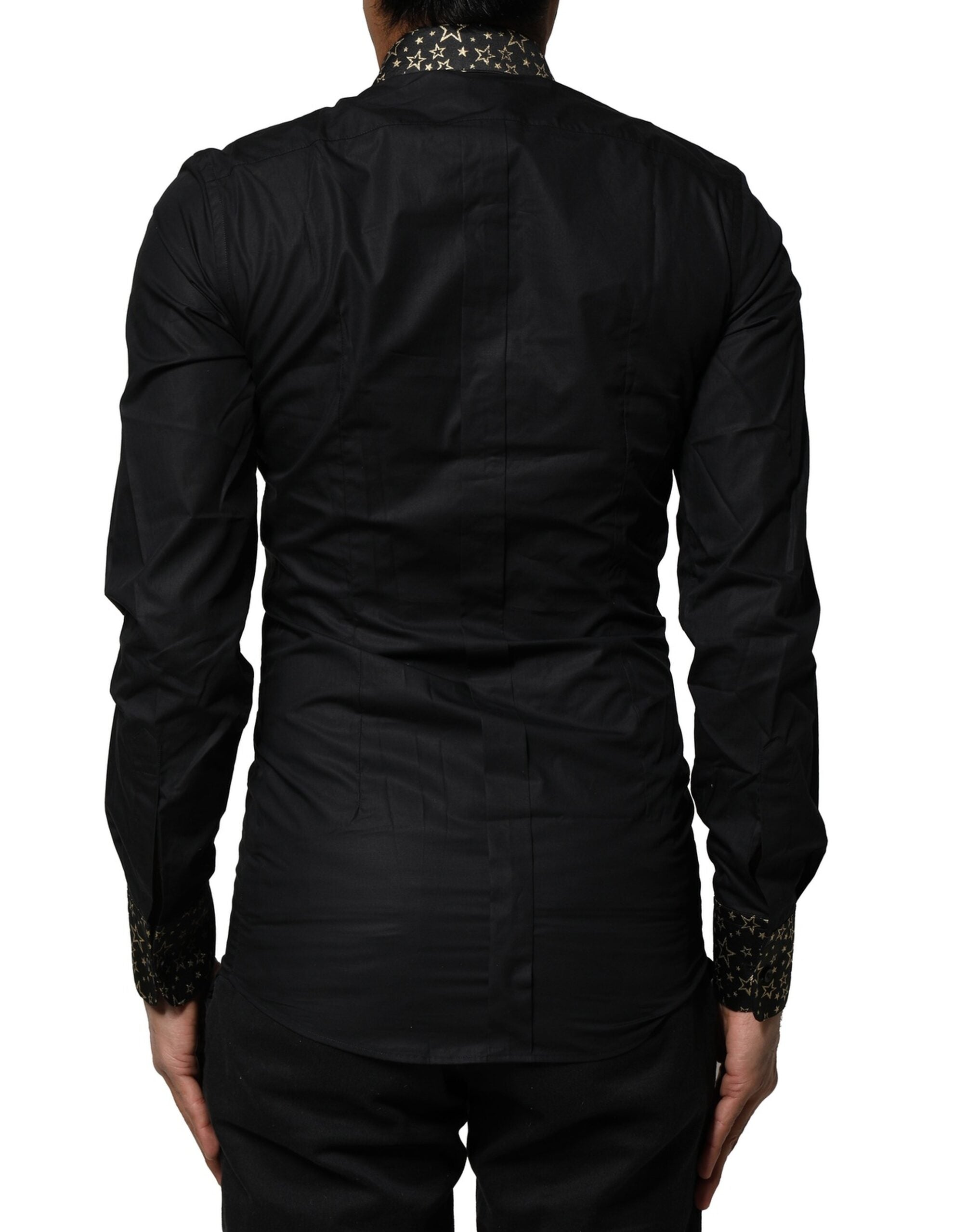 Chemise noire en coton Dolce & Gabbana avec manches longues et détails dorés, élégante pour homme.