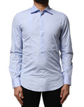 Chemise longue à manches longues Dolce & Gabbana Light Blue en coton, style élégant et décontracté.