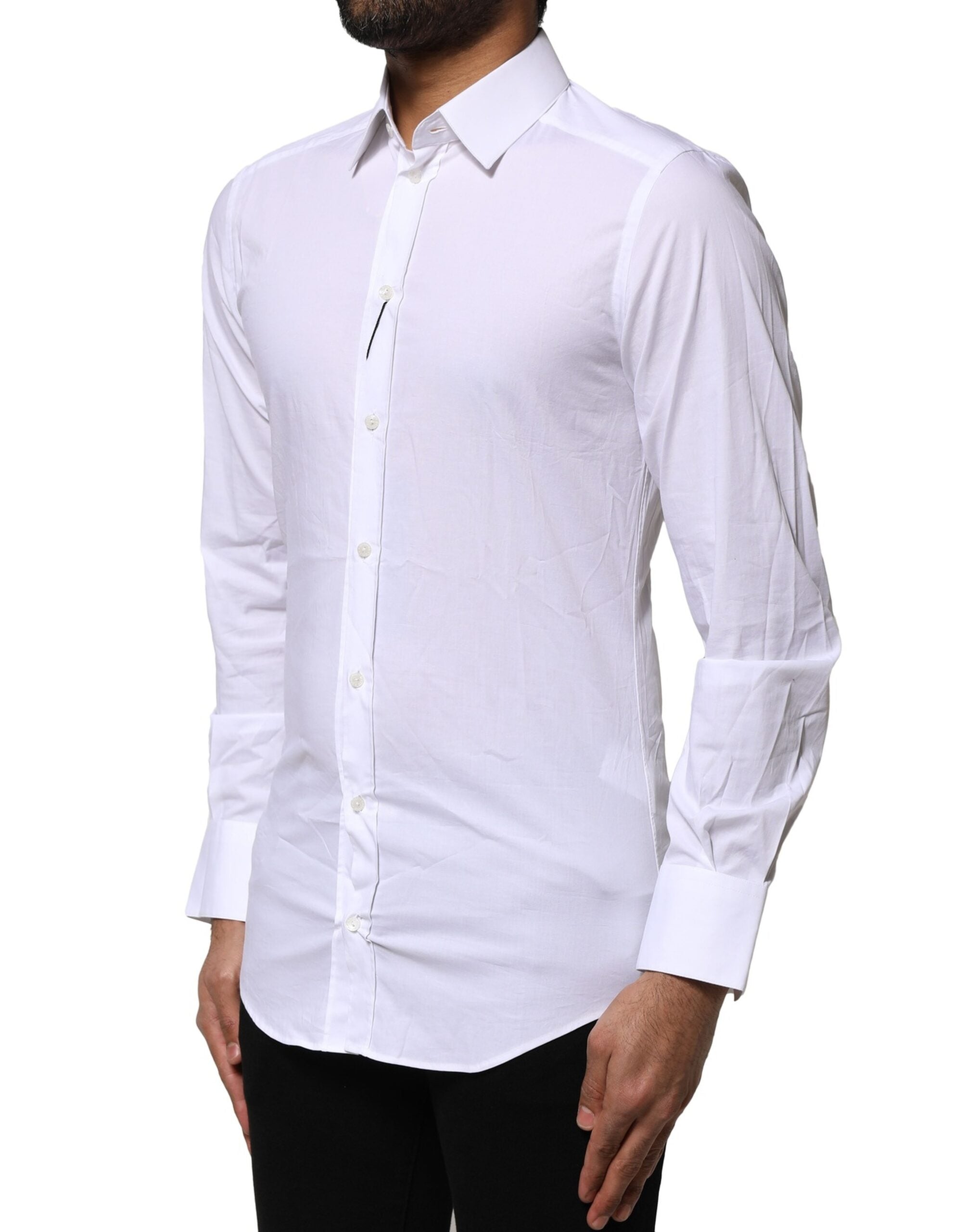 Chemise blanche en coton Dolce & Gabbana à manches longues avec détails dorés, élégante et sophistiquée.