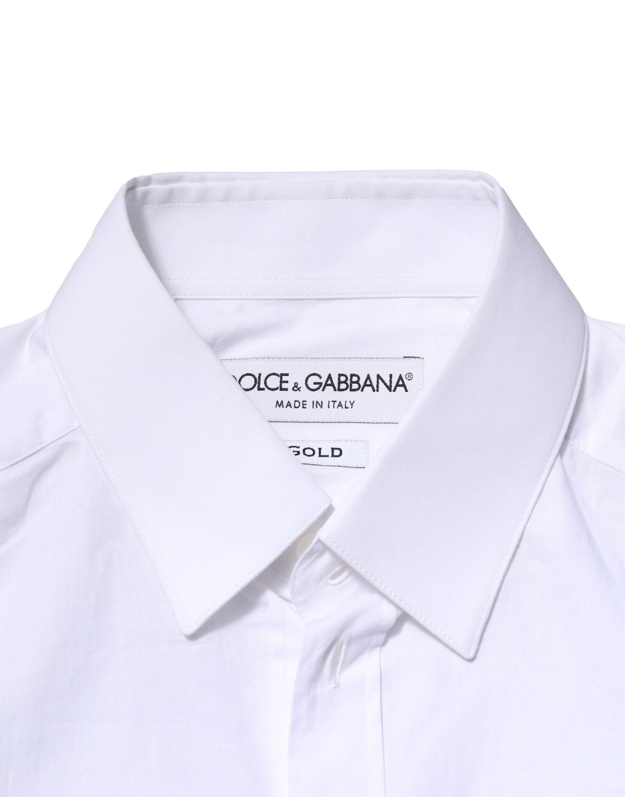 Chemise blanche en coton Dolce & Gabbana à manches longues avec détails dorés, élégante et sophistiquée.
