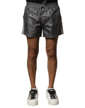 Shorts bermuda gris en polyester Dolce & Gabbana, taille moyenne, style décontracté, vue de face sur un fond neutre.