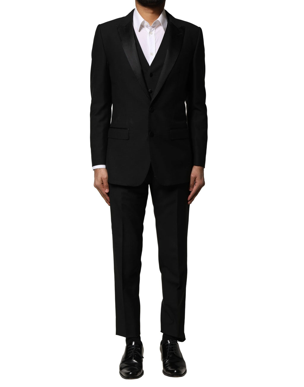 Costume trois pièces en laine noire Dolce & Gabbana, veste à un bouton, pantalon et gilet assortis, élégance classique.