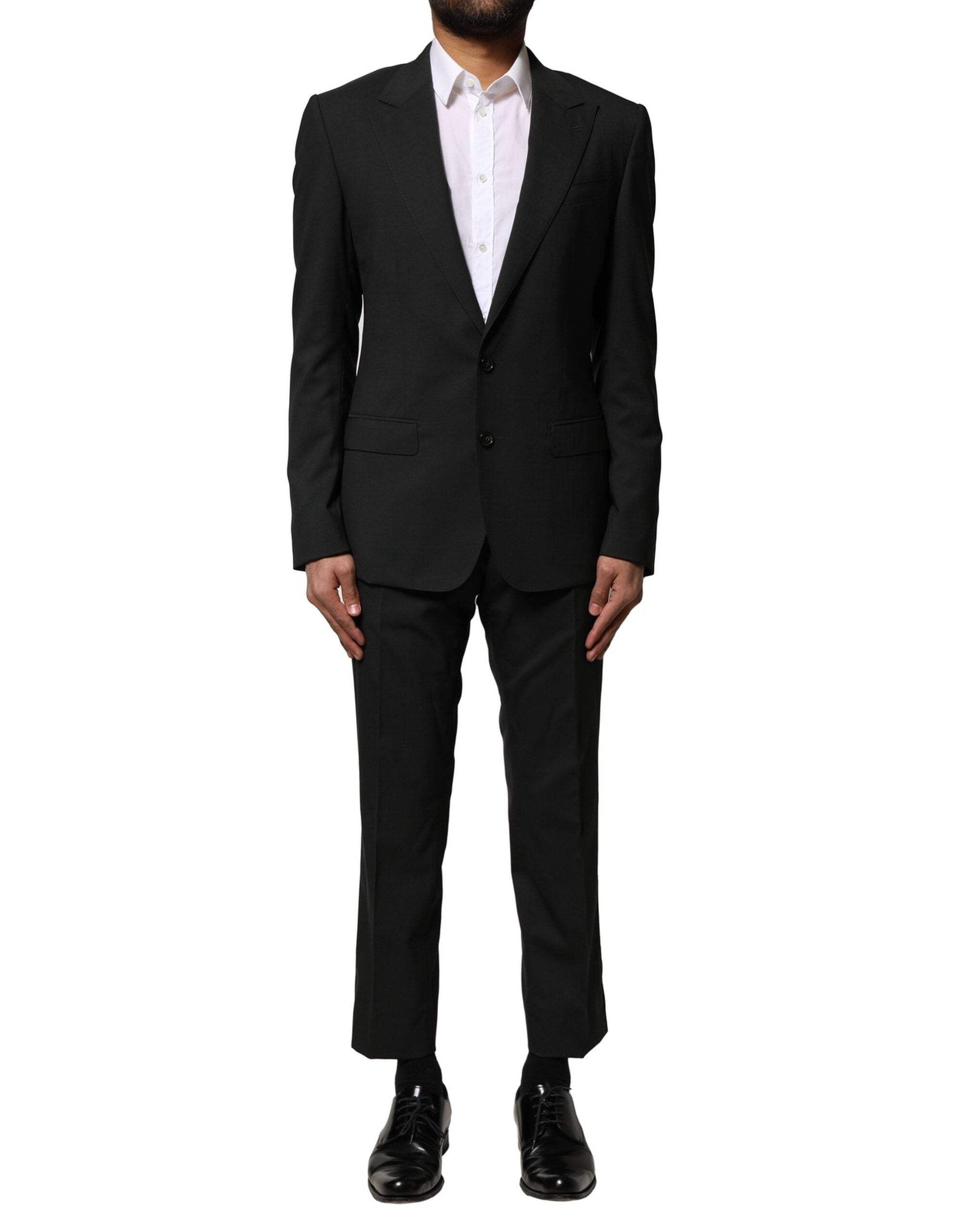 Costume deux pièces en laine noire Dolce & Gabbana, veste à boutons simple boutonnage et pantalon assorti, élégant et classique.