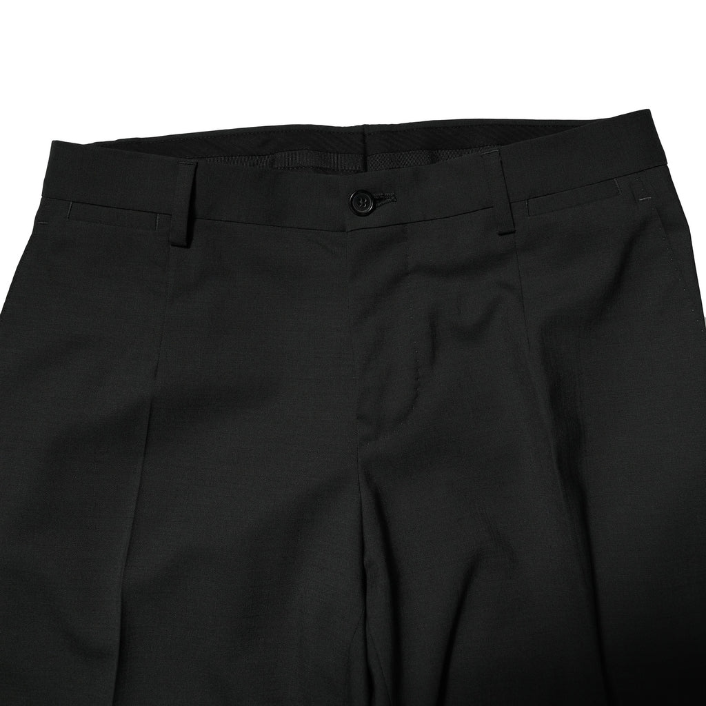 Costume noir en laine Dolce & Gabbana à deux pièces, veste à double boutonnage et pantalon élégant.
