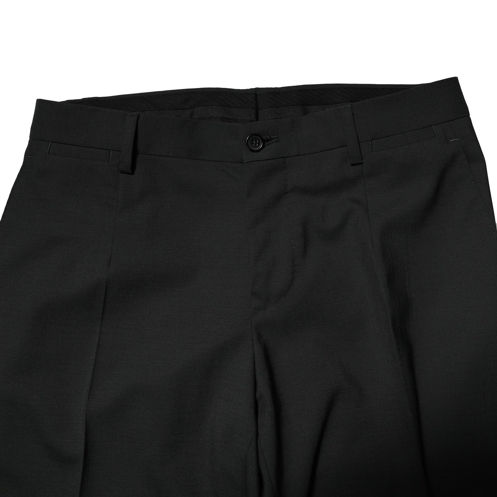 Costume noir en laine Dolce & Gabbana à deux pièces, veste à double boutonnage et pantalon élégant.
