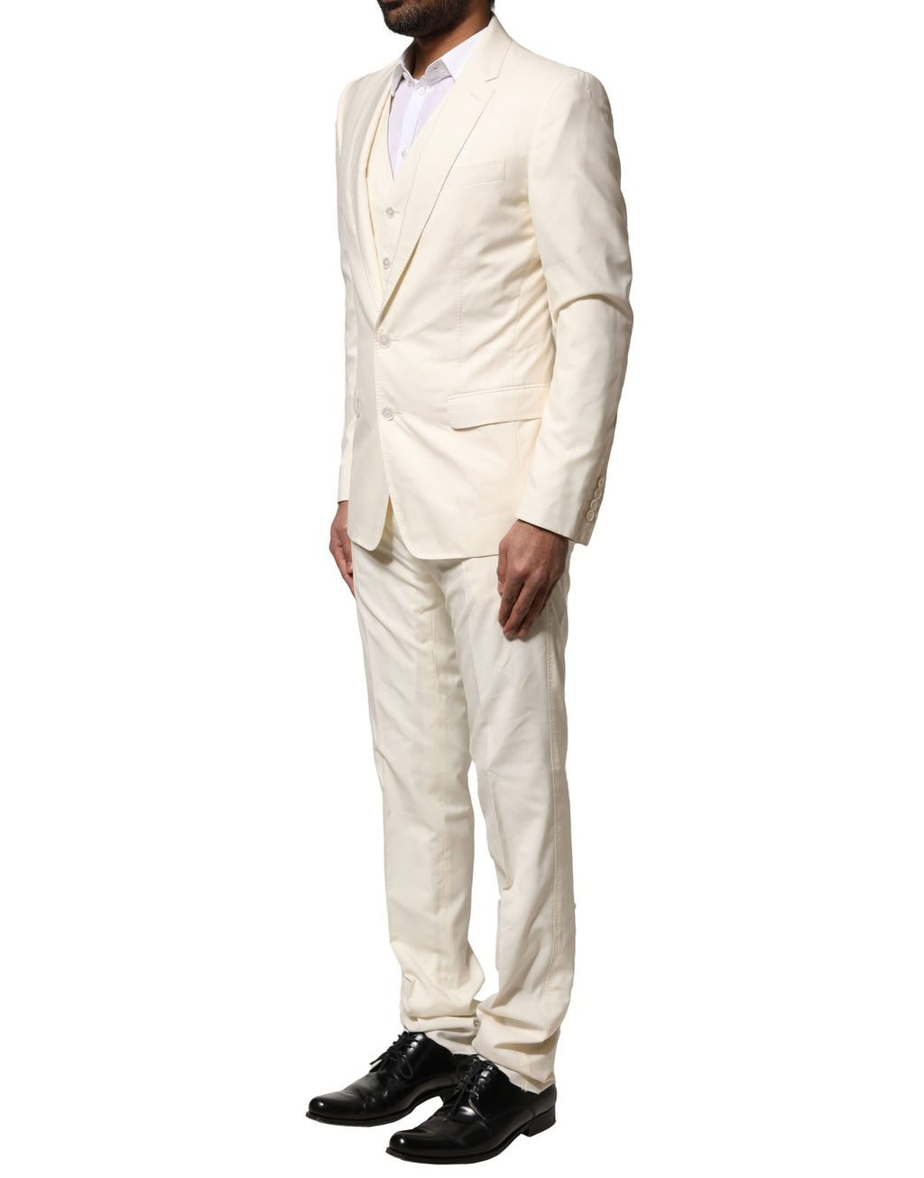 Costume en laine ivoire Dolce & Gabbana à trois pièces, veste à un bouton et pantalon, élégant et sophistiqué.