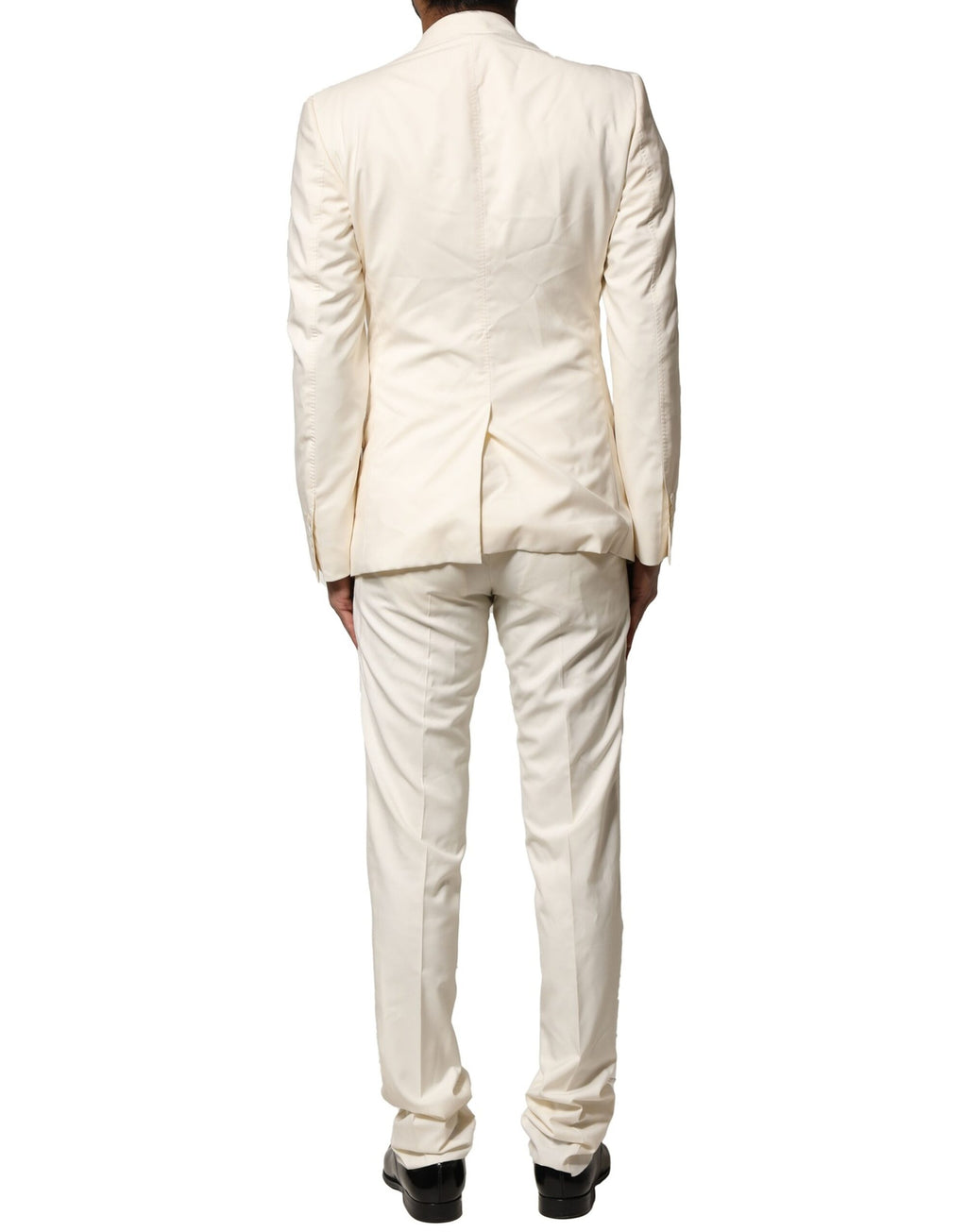 Costume trois pièces en laine ivoire Dolce & Gabbana, veste à simple boutonnage, pantalon et gilet élégants.