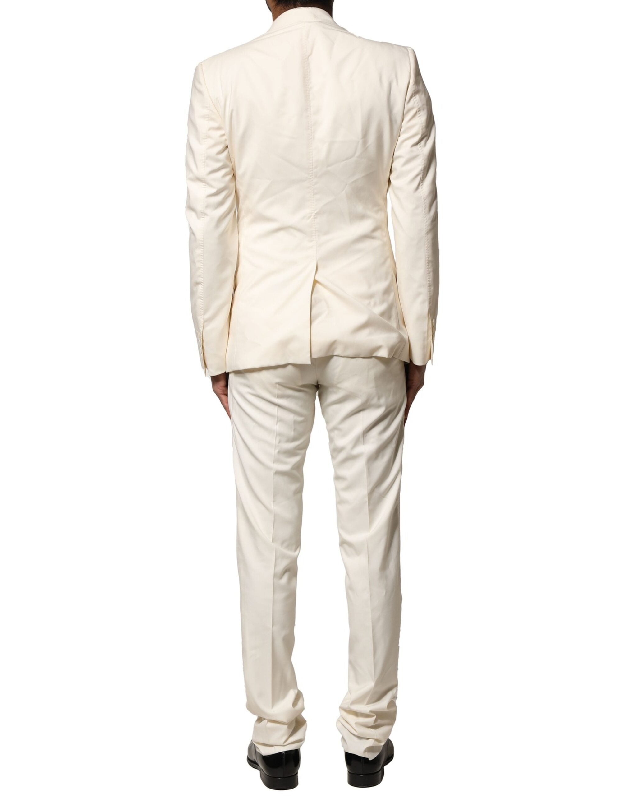 Costume trois pièces en laine ivoire Dolce & Gabbana, veste à simple boutonnage, pantalon et gilet élégants.