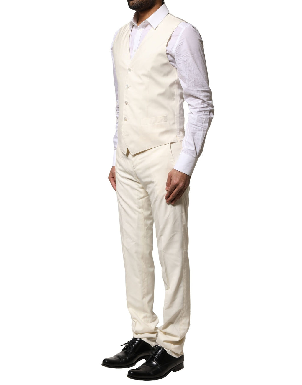 Costume en laine ivoire Dolce & Gabbana à 3 pièces, veste croisée simple boutonnage, pantalon et gilet assortis.