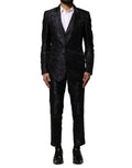 Costume noir en jacquard Dolce & Gabbana à trois pièces, veste à simple boutonnage, pantalon et gilet élégants.