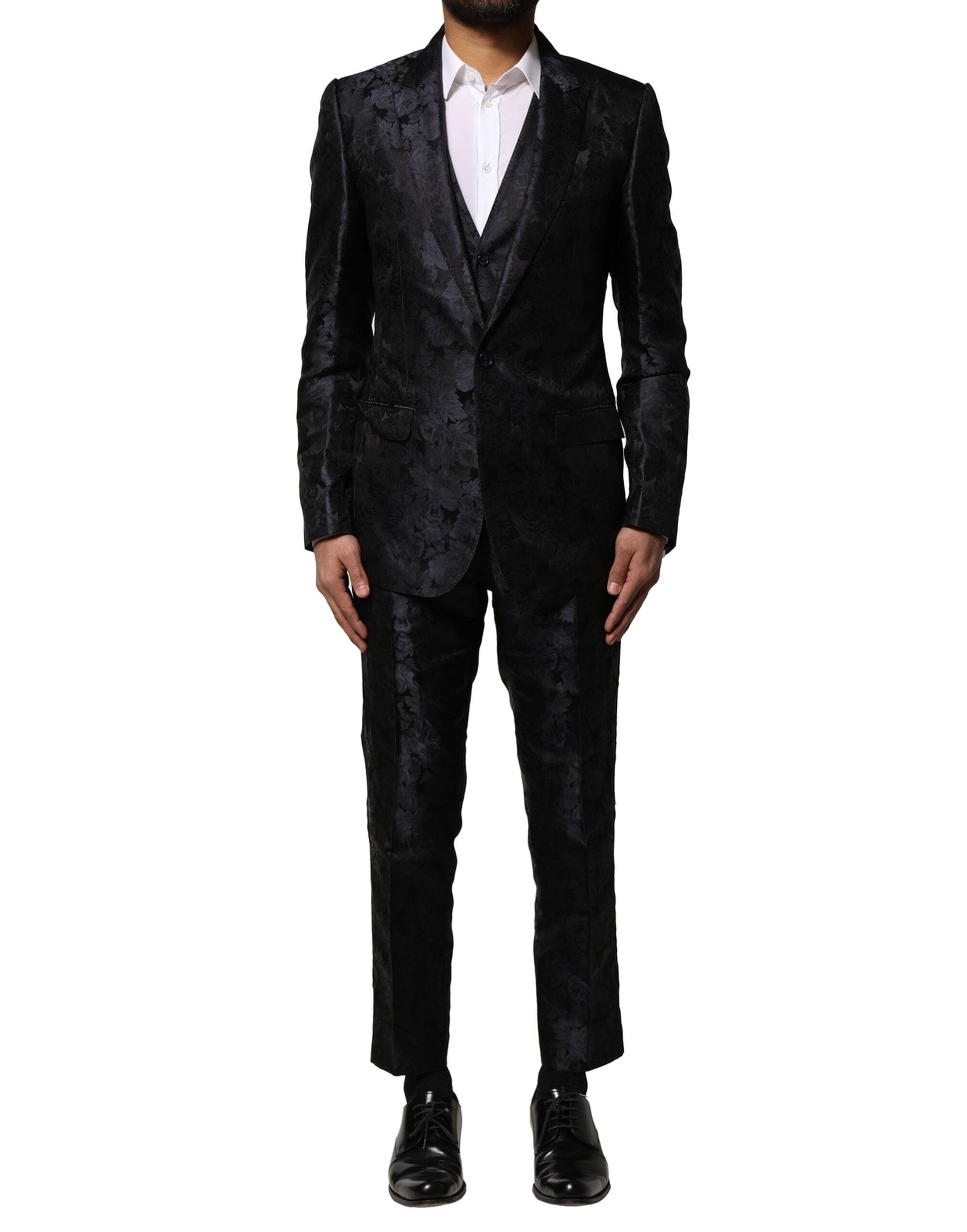 Costume noir en jacquard Dolce & Gabbana à trois pièces, veste à simple boutonnage, pantalon et gilet élégants.