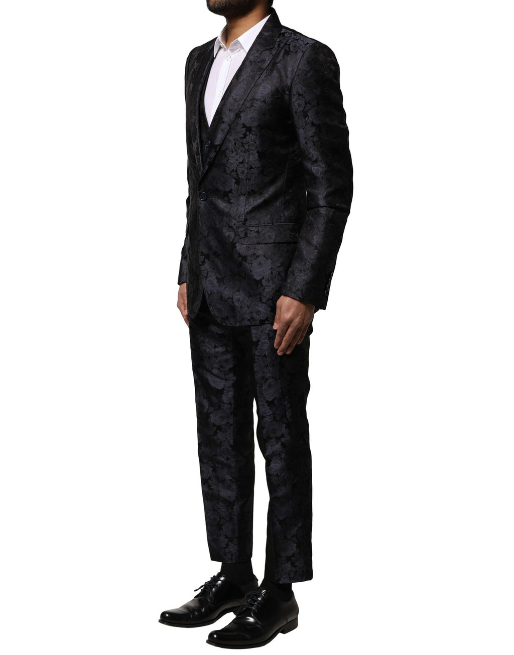 Costume noir Dolce & Gabbana en jacquard à 3 pièces, veste croisée à simple boutonnage et pantalon assorti.