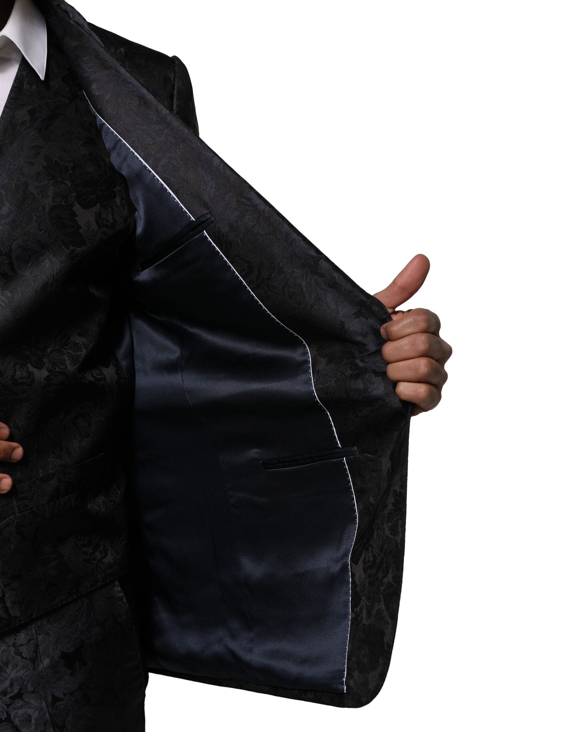Costume trois pièces noir en jacquard de Dolce & Gabbana, veste à un bouton, pantalon et gilet élégants pour homme.