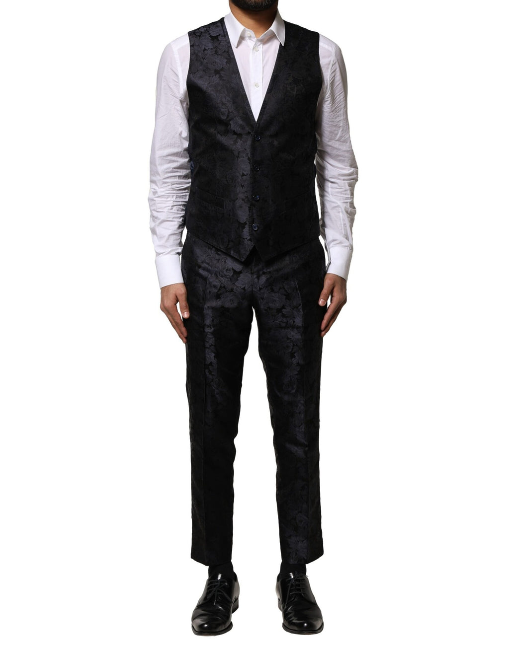 Costume trois pièces noir en jacquard de Dolce & Gabbana, veste à un bouton et pantalon assorti, élégant et sophistiqué.