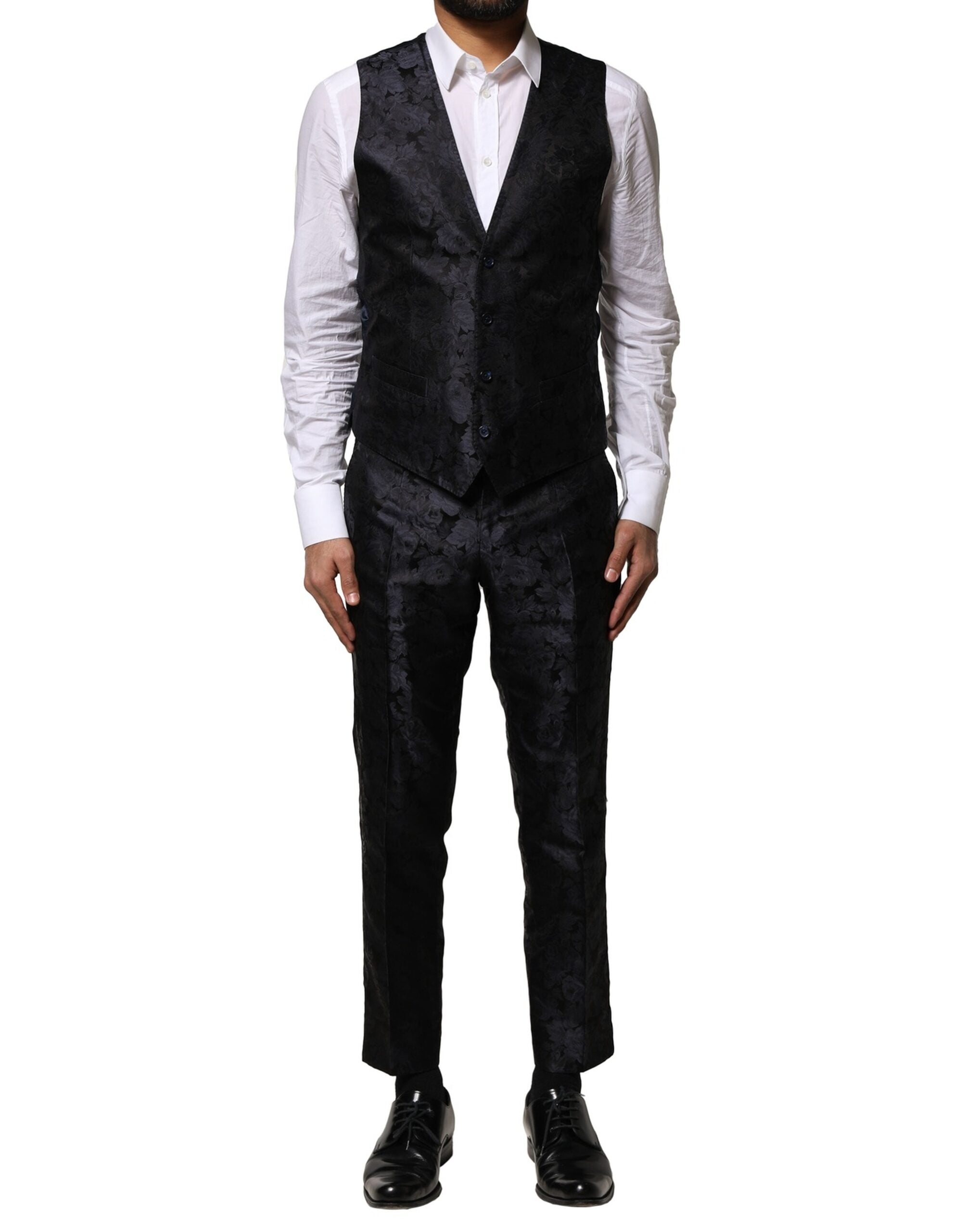 Costume trois pièces noir en jacquard de Dolce & Gabbana, veste à un bouton et pantalon assorti, élégant et sophistiqué.