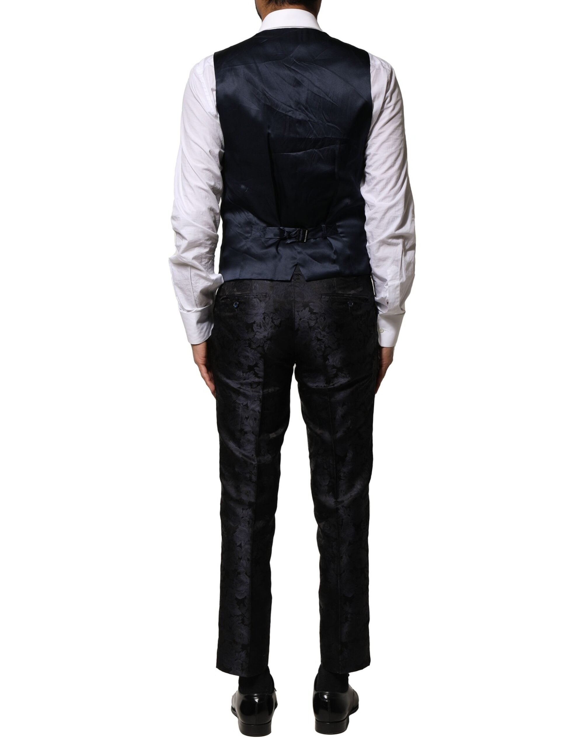 Costume homme en jacquard noir Dolce & Gabbana, 3 pièces, avec veste à un bouton et pantalon assorti, élégant et sophistiqué.