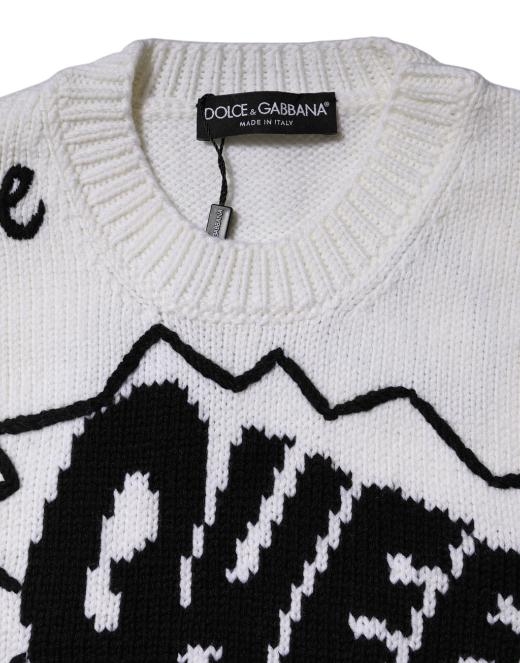 Pull-over en laine blanche de Dolce & Gabbana avec col rond, confortable et élégant pour un style casual chic.
