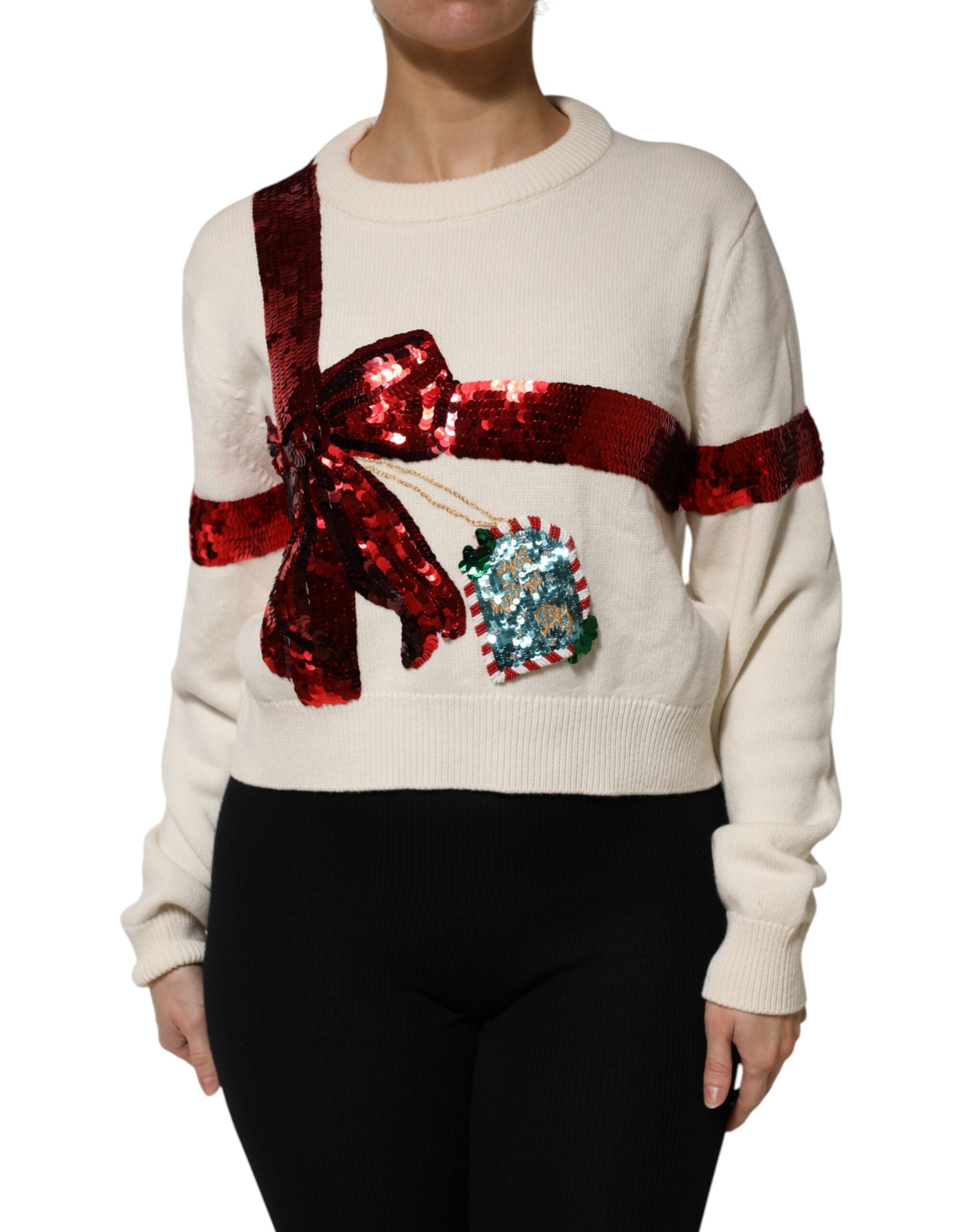 Pull en laine blanc Dolce & Gabbana, col rond avec sequins brillants, version élégante et sophistiquée.