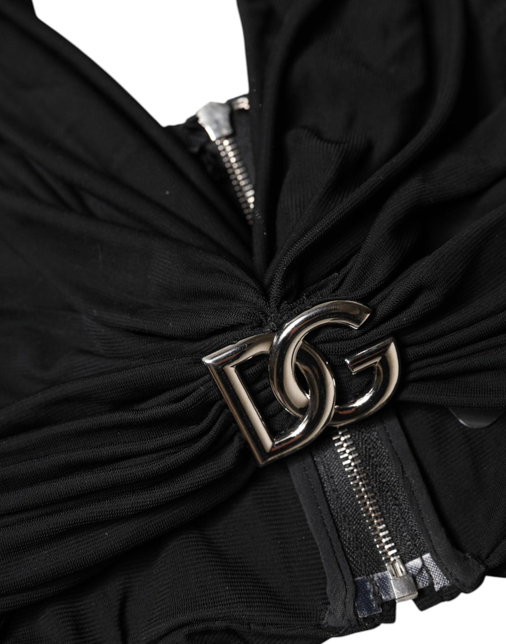 Haut bustier noir Dolce & Gabbana en viscose courte avec col halter, visible avec détails élégants et tissu texturé.