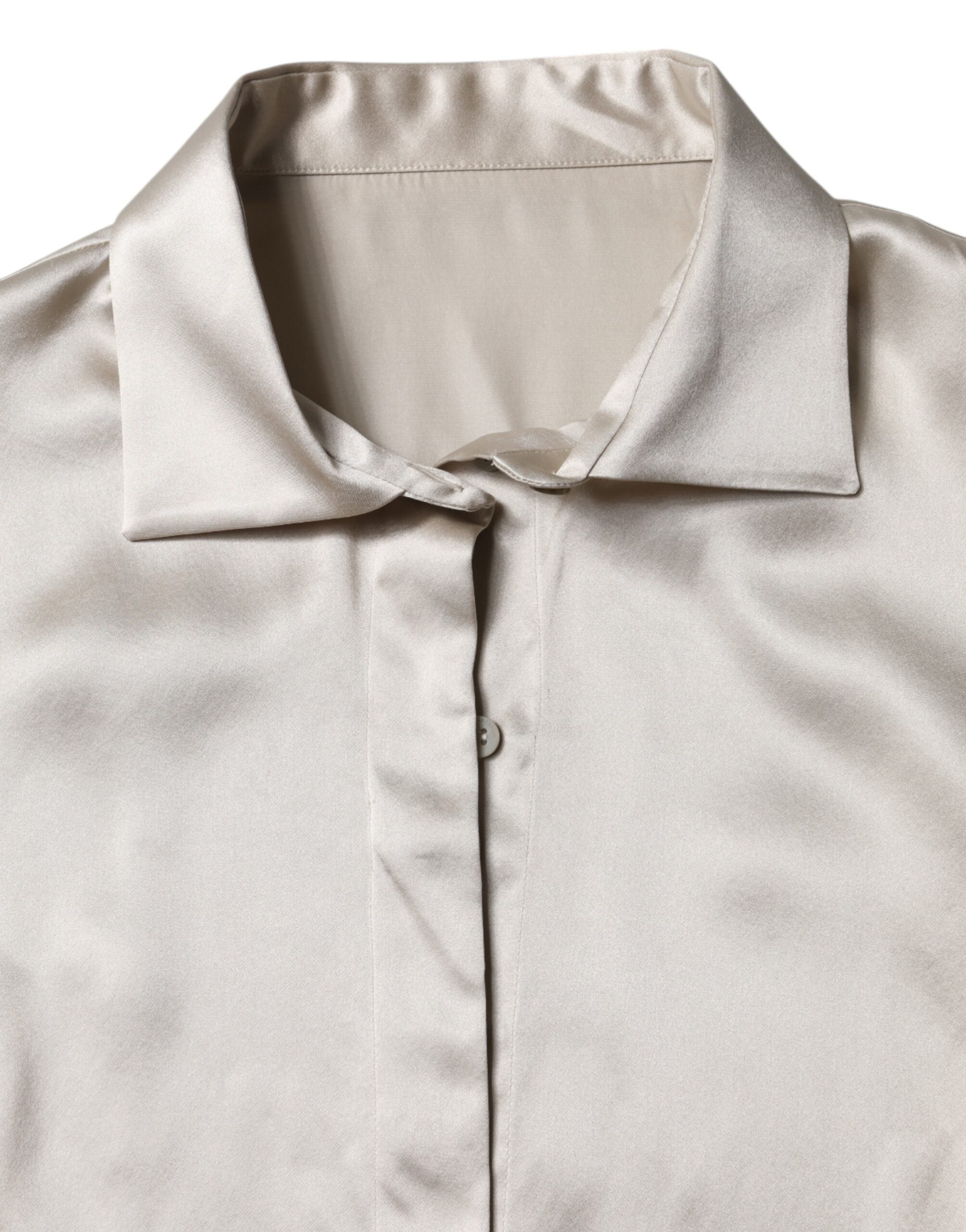 Haut en satin beige Dolce & Gabbana avec col en soie et manches longues, élégant et sophistiqué.
