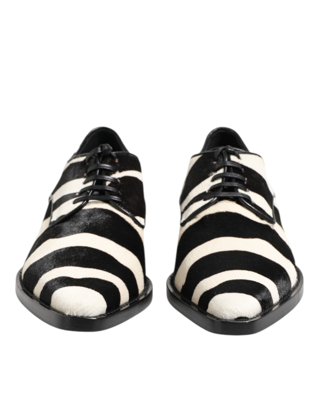 Chaussures Dolce & Gabbana en cuir de zèbre noir et blanc avec fourrure de poney, élégantes et sophistiquées.