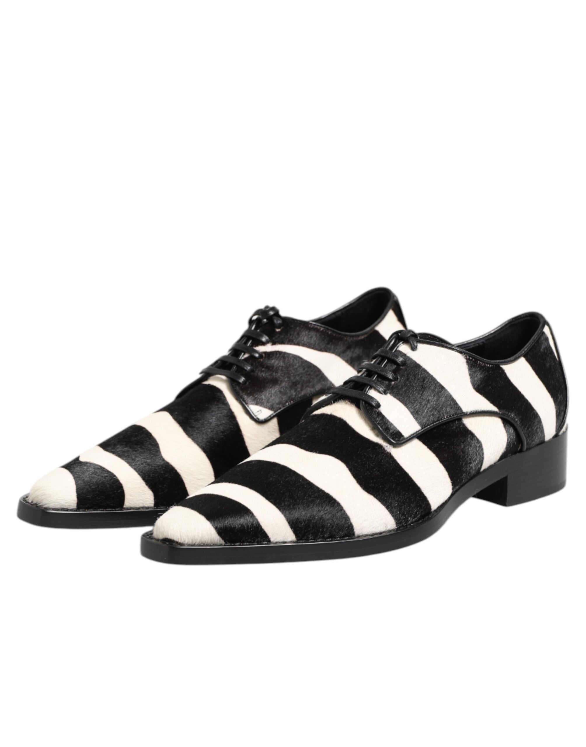 Chaussures Dolce & Gabbana en cuir de zèbre noir et blanc avec fourrure de poney, élégantes et sophistiquées.