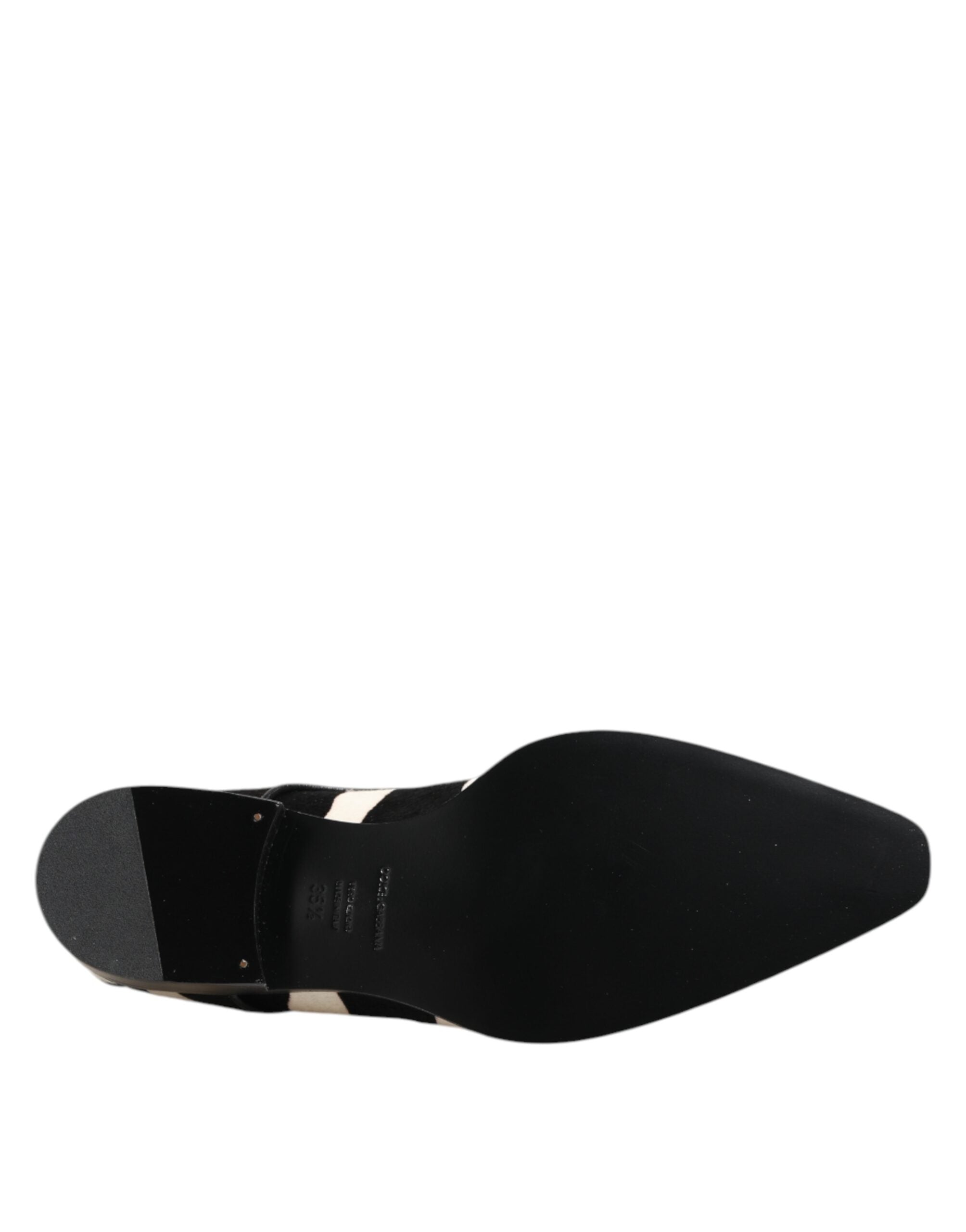 Chaussures Dolce & Gabbana noires et blanches en fourrure de zèbre et poney, style élégant et sophistiqué.