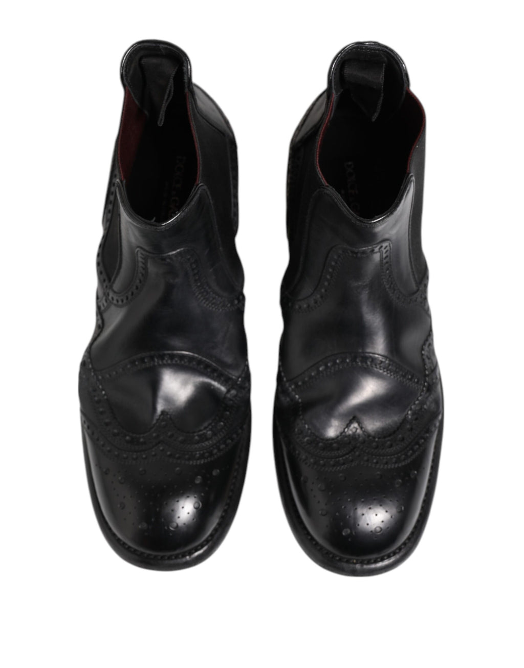 Chaussures bottines en cuir noir Dolce & Gabbana, chaussures à enfiler élégantes pour femmes, style moderne et sophistiqué.