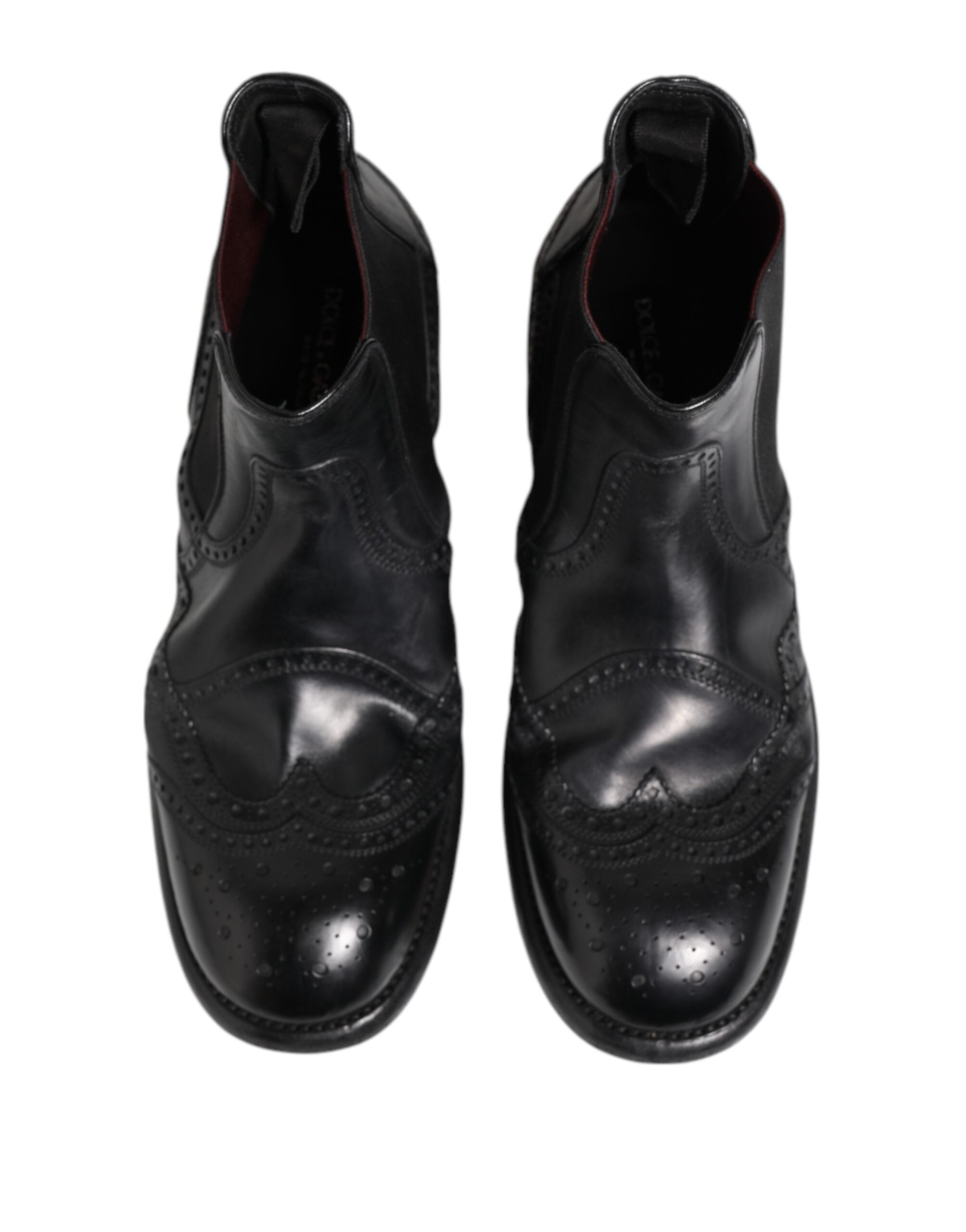 Chaussures bottines en cuir noir Dolce & Gabbana, chaussures à enfiler élégantes pour femmes, style moderne et sophistiqué.